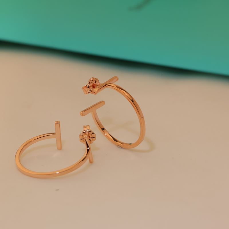 T*f*ny earrings